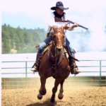 shooting rifle horseback